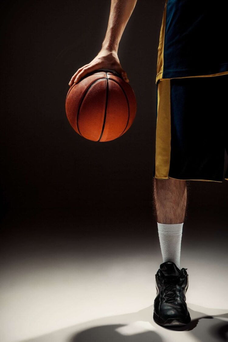 A man holding a basketball