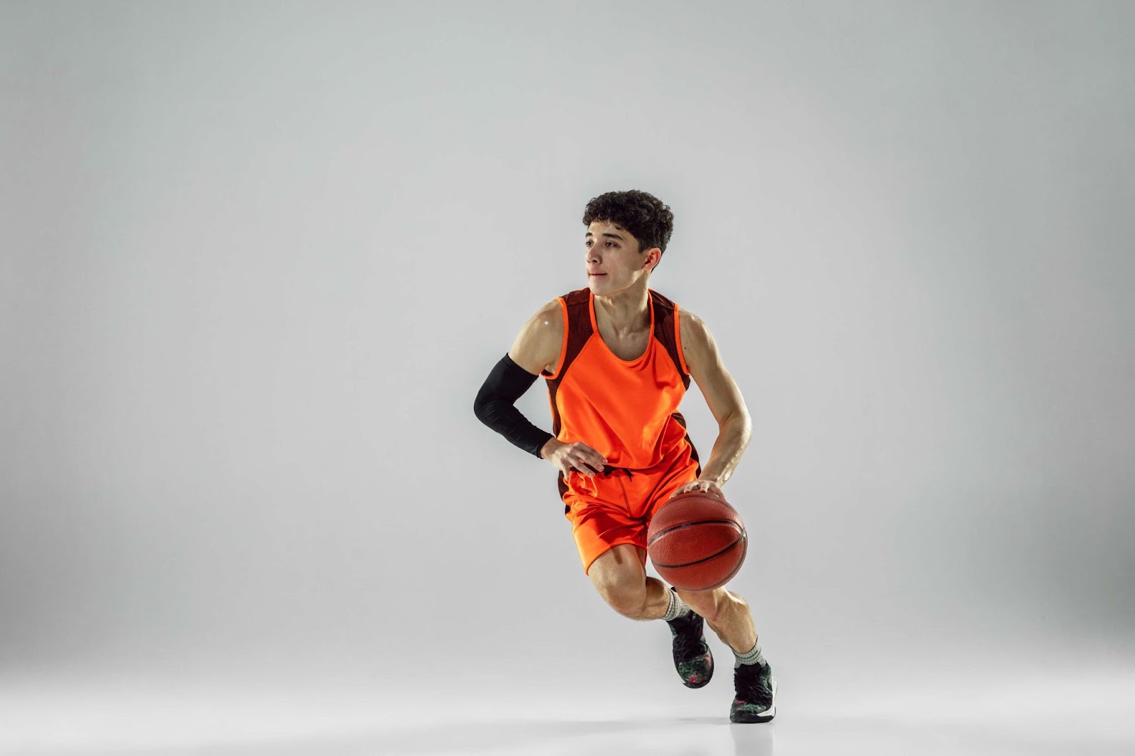 The guy's playing basketball