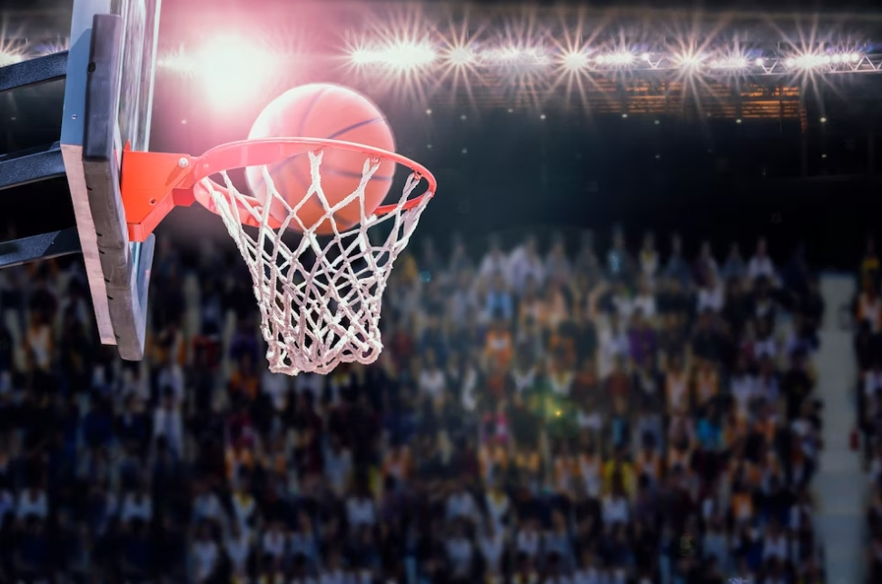 basketball scoring during a match, arena behind it