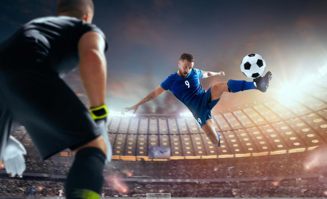 Soccer players in action on professional stadium, one is kicking the ball