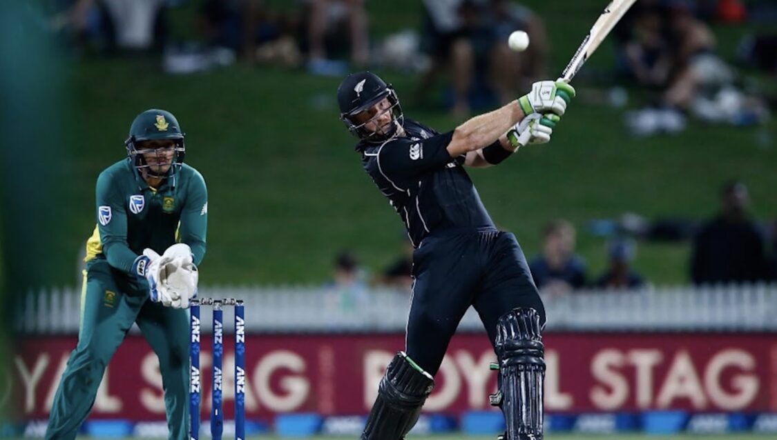 Man is playing cricket