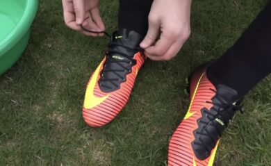 man tying his shoelaces