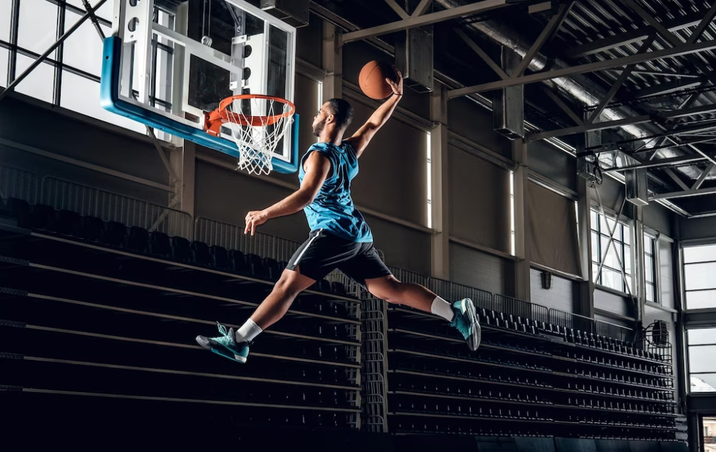 basketball player in action on a basketball court