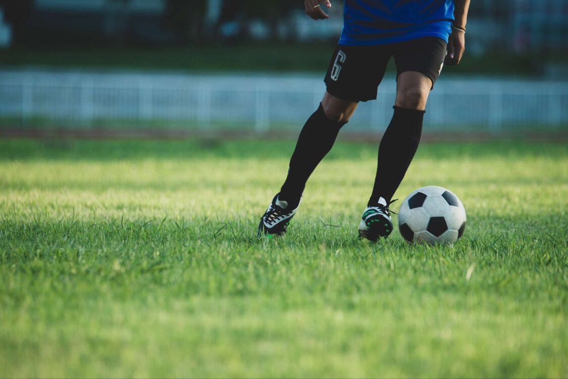 A man is playing football